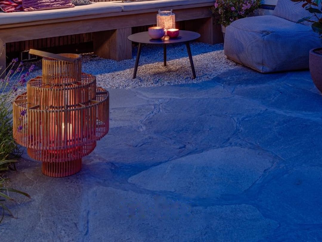 Terrace seating with wall lights and lanterns